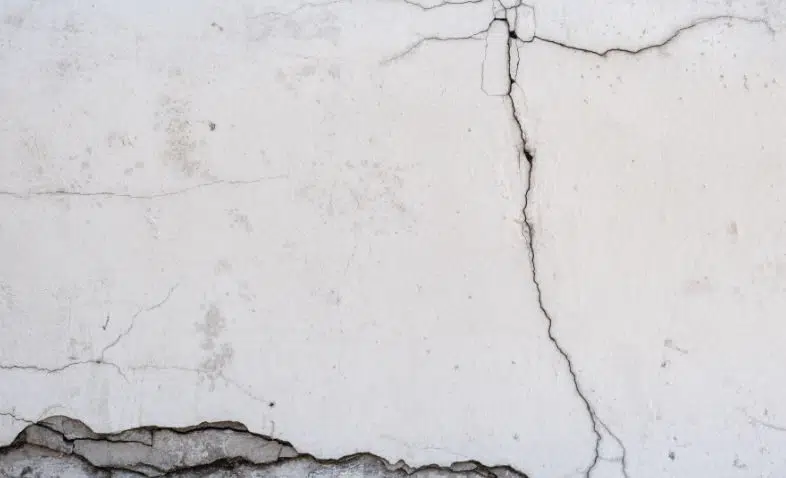 Cracks in a white wall